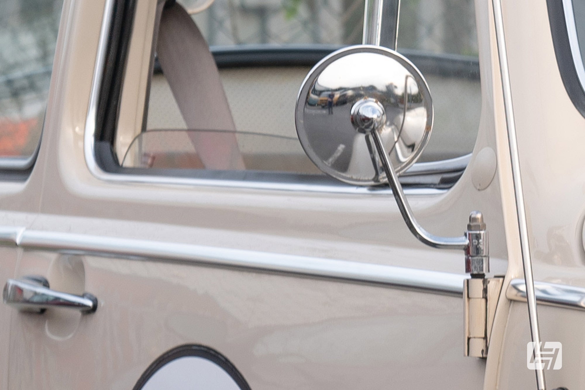 Beige VW Beetle fitted with hinge pin mounted round door mirrors