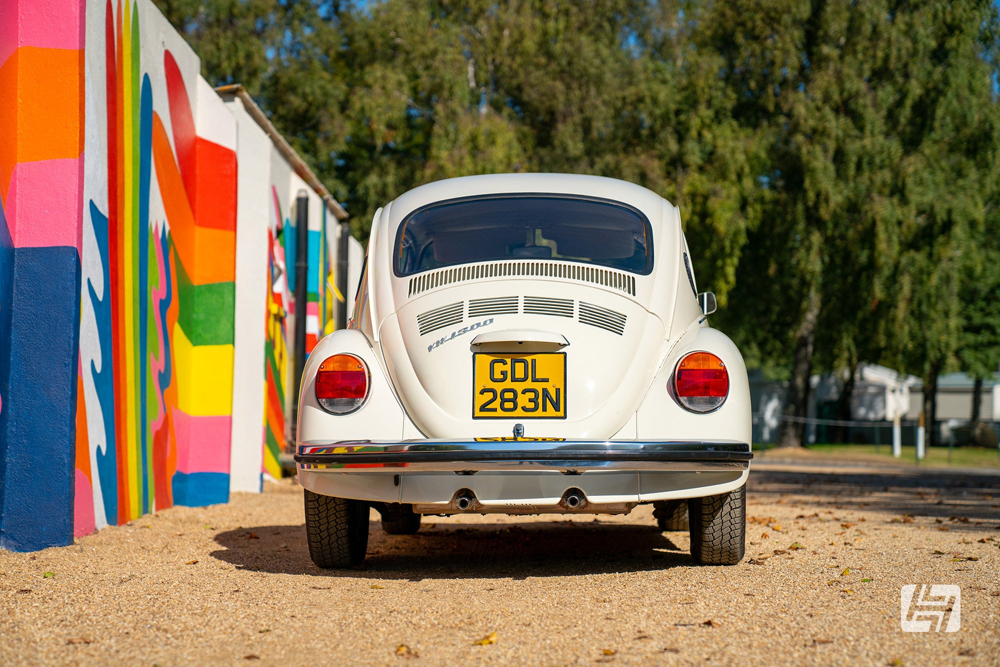 Rear shot of late spec VW Beetle in white 