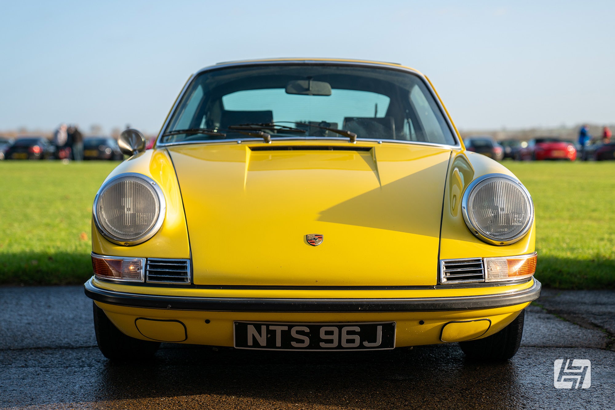 Front view of classic yellow Porsche 911